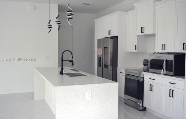 1116 Eight Street, Lehigh Acres, FL 33972