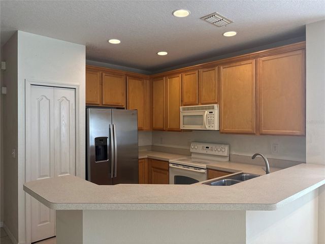 9428 FLOWERING COTTONWOOD ROAD 660, Orlando, FL 32832