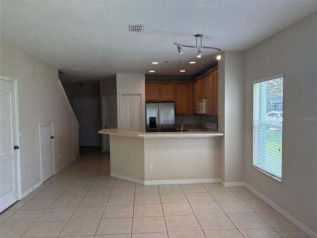 9428 FLOWERING COTTONWOOD ROAD 660, Orlando, FL 32832