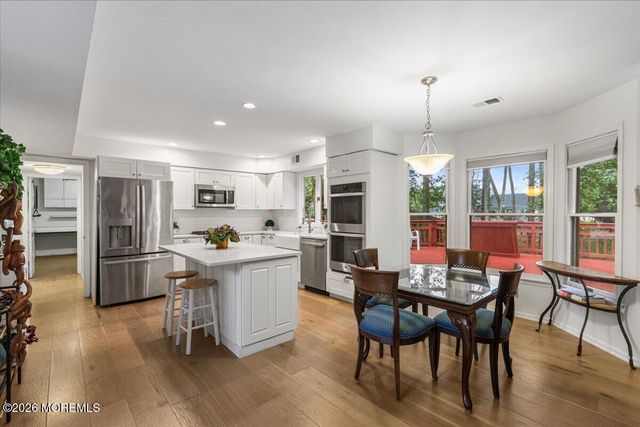 25 Winding Woods Way, Manalapan, NJ 07726