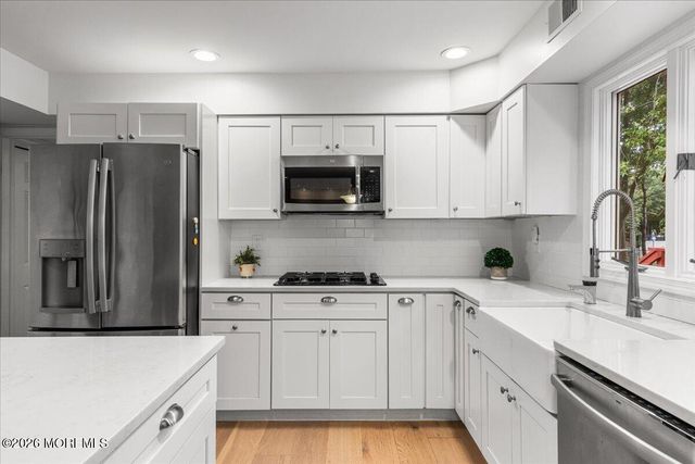 25 Winding Woods Way, Manalapan, NJ 07726