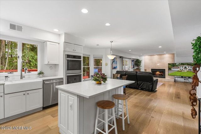 25 Winding Woods Way, Manalapan, NJ 07726