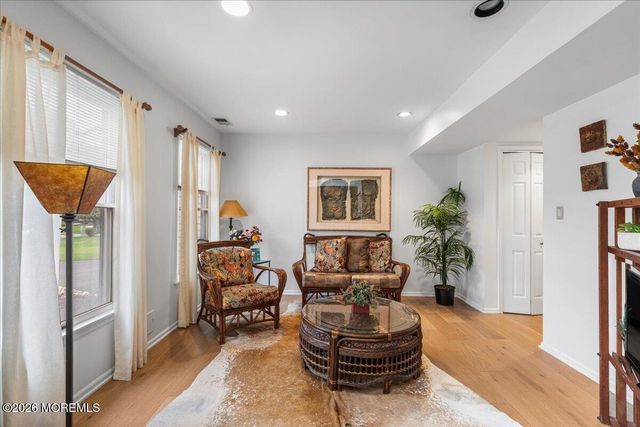 25 Winding Woods Way, Manalapan, NJ 07726