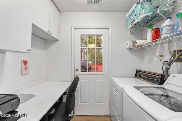 25 Winding Woods Way, Manalapan, NJ 07726