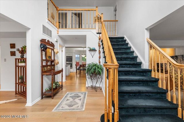 25 Winding Woods Way, Manalapan, NJ 07726