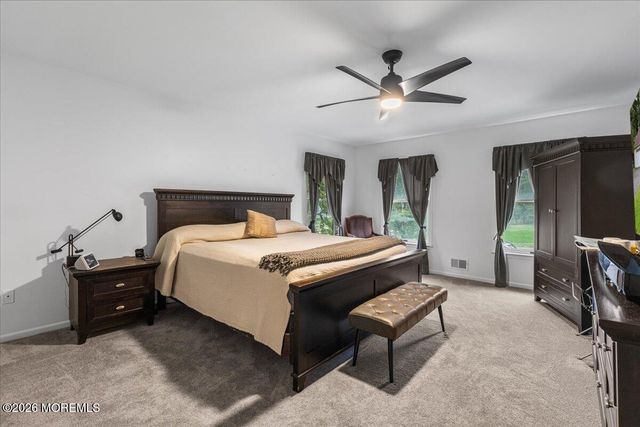 25 Winding Woods Way, Manalapan, NJ 07726