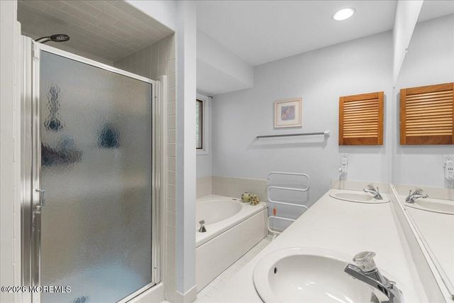 25 Winding Woods Way, Manalapan, NJ 07726