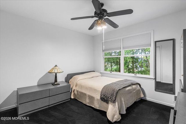 25 Winding Woods Way, Manalapan, NJ 07726