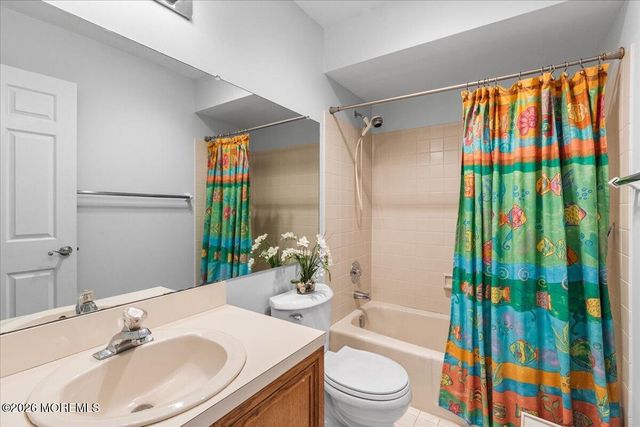 25 Winding Woods Way, Manalapan, NJ 07726