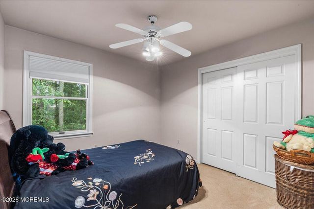 25 Winding Woods Way, Manalapan, NJ 07726