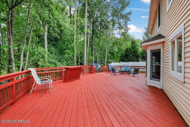 25 Winding Woods Way, Manalapan, NJ 07726