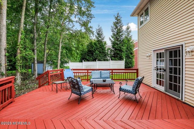 25 Winding Woods Way, Manalapan, NJ 07726
