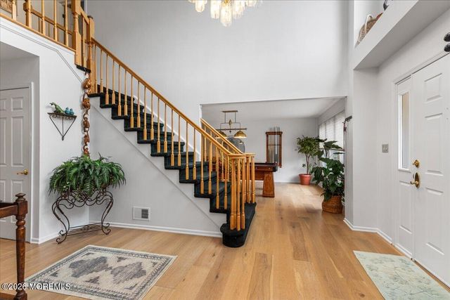 25 Winding Woods Way, Manalapan, NJ 07726