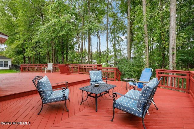 25 Winding Woods Way, Manalapan, NJ 07726