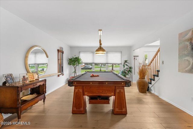 25 Winding Woods Way, Manalapan, NJ 07726