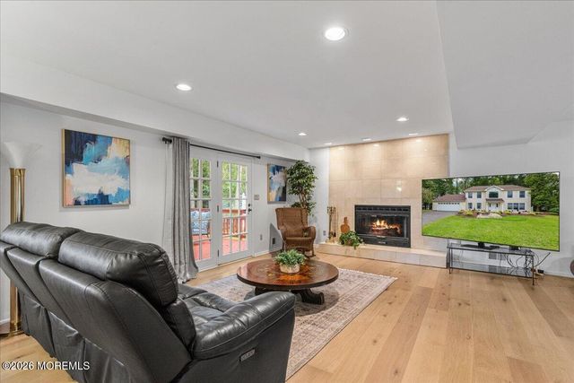 25 Winding Woods Way, Manalapan, NJ 07726