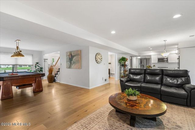 25 Winding Woods Way, Manalapan, NJ 07726