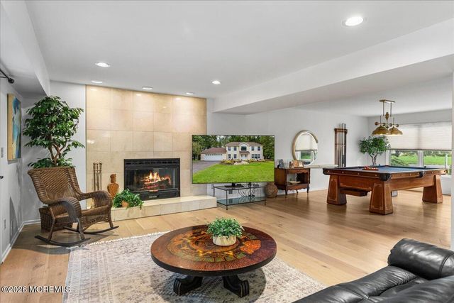 25 Winding Woods Way, Manalapan, NJ 07726