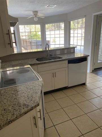 8206 Ash Valley Drive, Spring, TX 77379