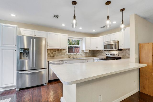 124 Rosewood Circle, Jupiter, FL 33458