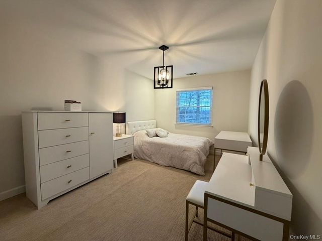 100 Woodlake Drive W, Woodbury, NY 11797