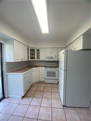 191 Wimbledon Lake Drive, Plantation, FL 33324
