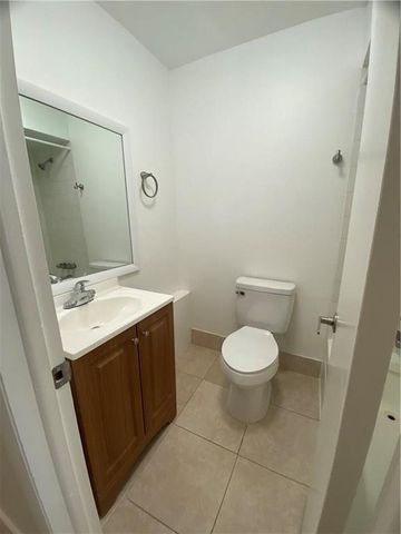 191 Wimbledon Lake Drive, Plantation, FL 33324
