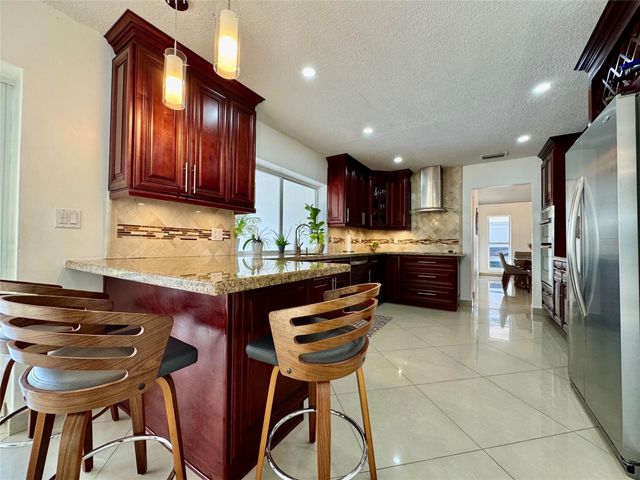 481 W Tropical Way, Plantation, FL 33317