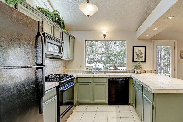 12 Fairmeade Bend Drive, The Woodlands, TX 77381