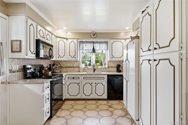 56 Wood Avenue, Amityville, NY 11701