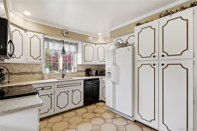 56 Wood Avenue, Amityville, NY 11701