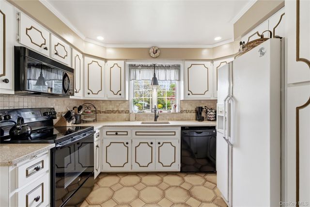 56 Wood Avenue, Amityville, NY 11701