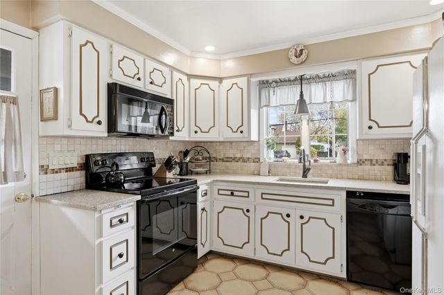 56 Wood Avenue, Amityville, NY 11701