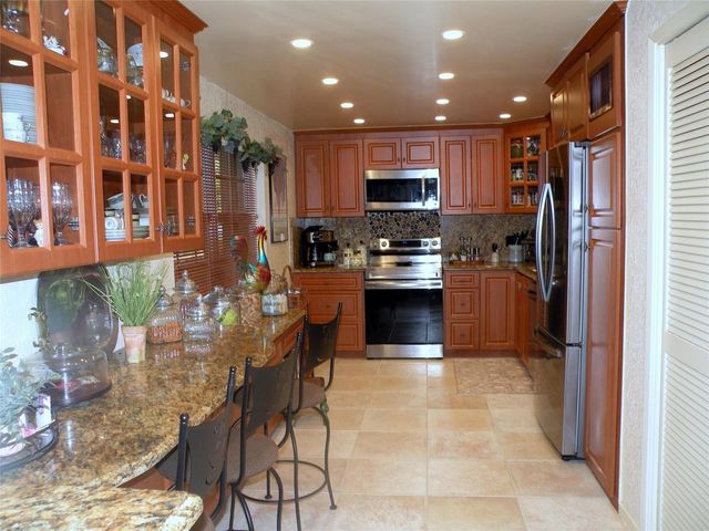 4221 W Palm Aire Drive 102, Pompano Beach, FL 33069