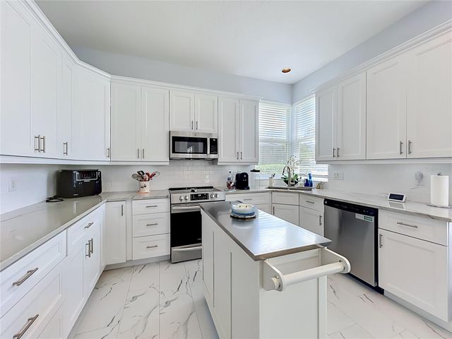 909 GROVESMERE LOOP, Ocoee, FL 34761