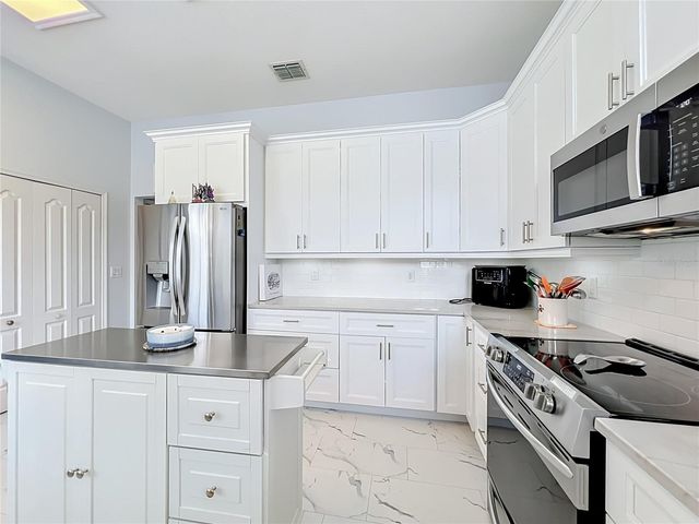 909 GROVESMERE LOOP, Ocoee, FL 34761