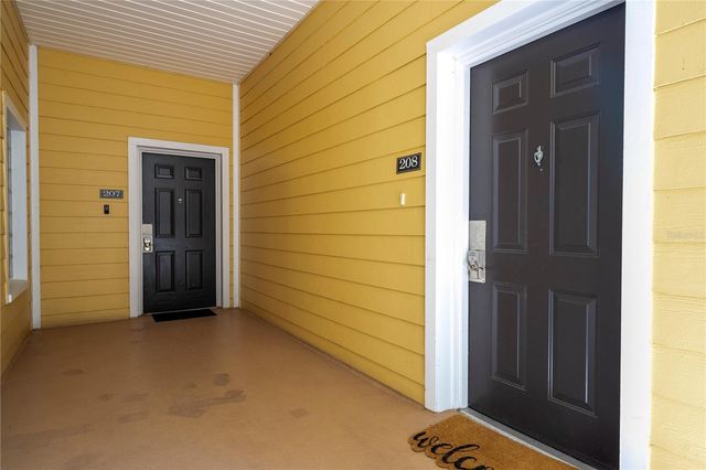 9055 TREASURE TROVE LANE 208, Kissimmee, FL 34747