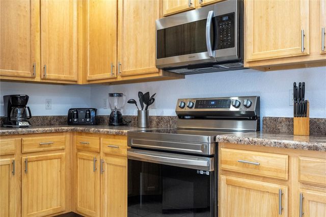 9055 TREASURE TROVE LANE 208, Kissimmee, FL 34747