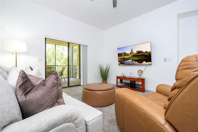 9055 TREASURE TROVE LANE 208, Kissimmee, FL 34747