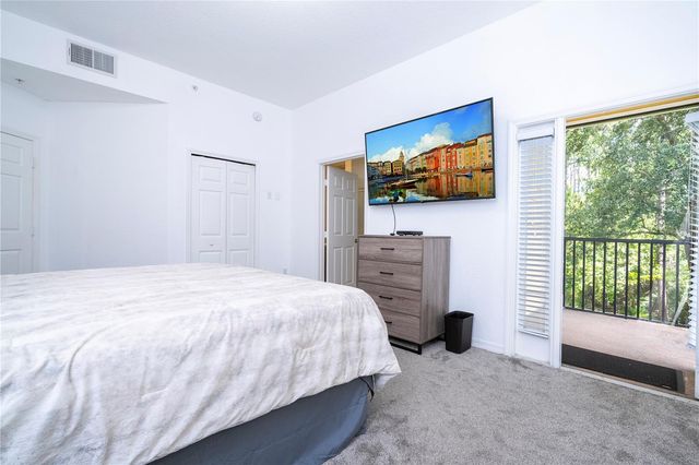 9055 TREASURE TROVE LANE 208, Kissimmee, FL 34747