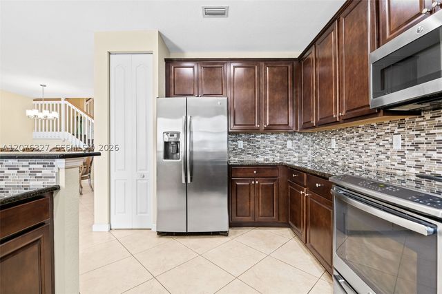 8442 Lake Majesty Ln, Parkland, FL 33076