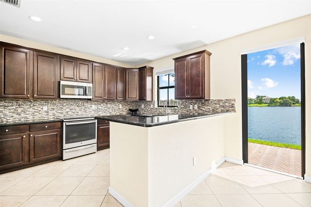 8442 Lake Majesty Ln, Parkland, FL 33076