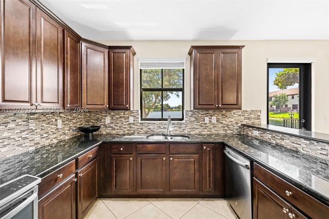 8442 Lake Majesty Ln, Parkland, FL 33076