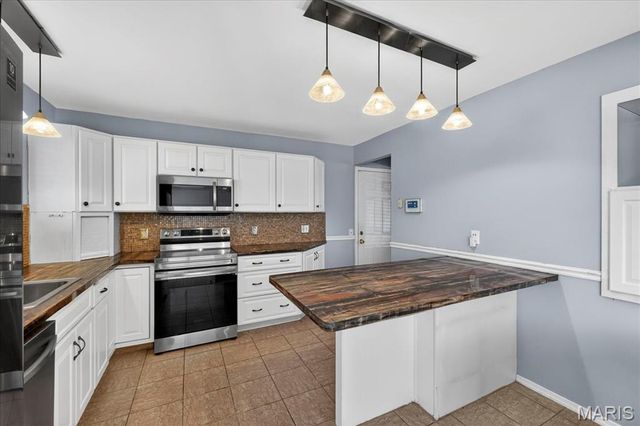 9 Darwin Court, Florissant, MO 63033