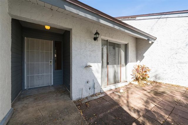 126 DAHLIA VILLAGE CIRCLE 82, Orlando, FL 32807