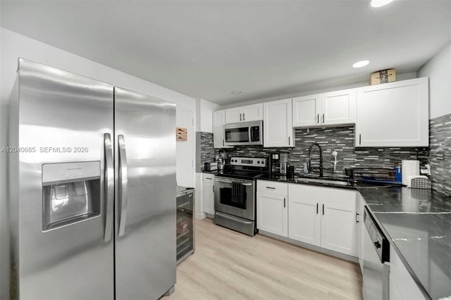 427 Golden Isles Drive 16H, Hallandale Beach, FL 33009
