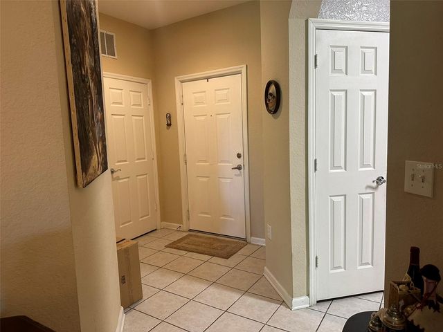 8710 SARATOGA INLET DRIVE 207, Orlando, FL 32829