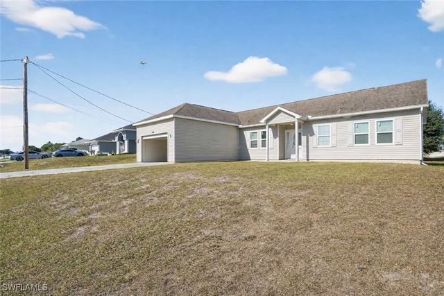 2808 34th ST SW, Lehigh Acres, FL 33976