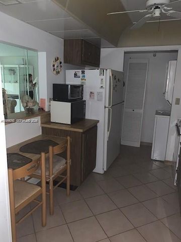 303 Racquet Club Road 206, Weston, FL 33326