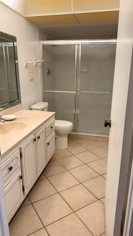 303 Racquet Club Road 206, Weston, FL 33326